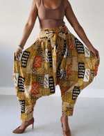 Load image into Gallery viewer, Tribal/Kente Print Harem Style Pants Dazzled By B
